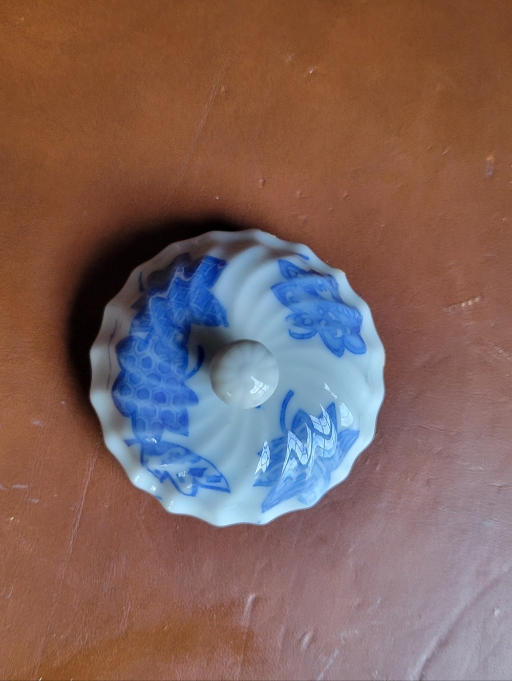 lid from a piece of blue and white Japanese Imari-Arita ware porcelain